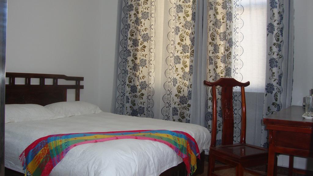 Faier Harbour Inn Dali (Yunnan) Quarto foto