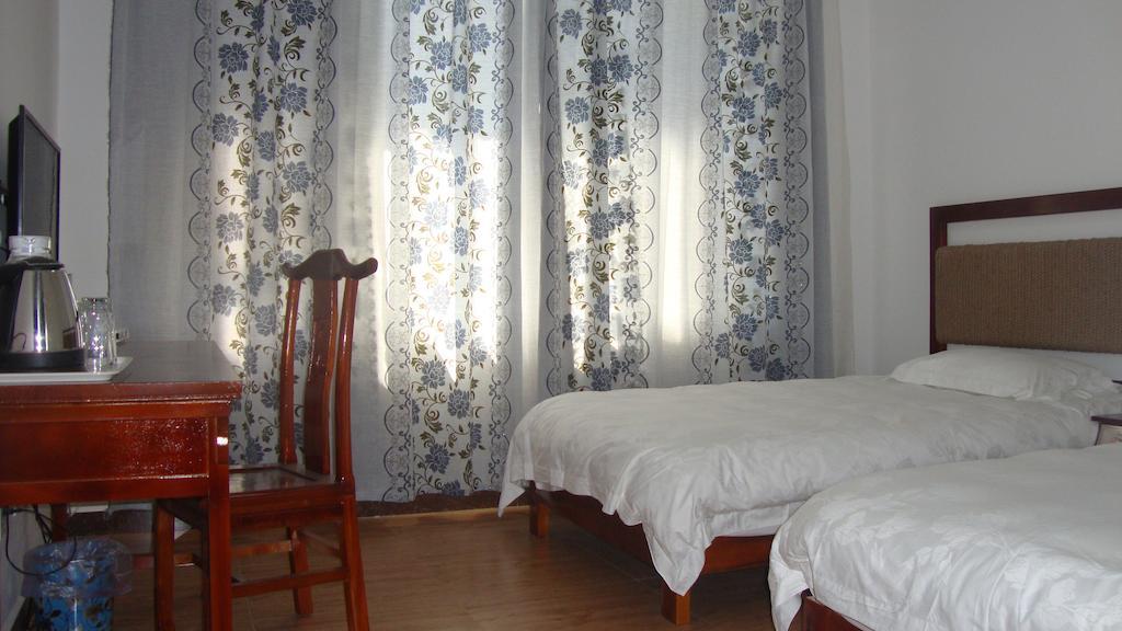 Faier Harbour Inn Dali (Yunnan) Quarto foto